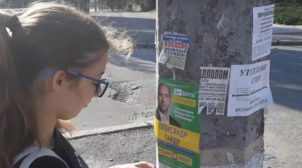 В Николаеве кандидат от «Слуги народа» заставляет детей незаконно расклеивать свою агитацию. ВИДЕО