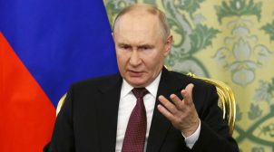путін