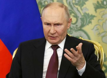 путін