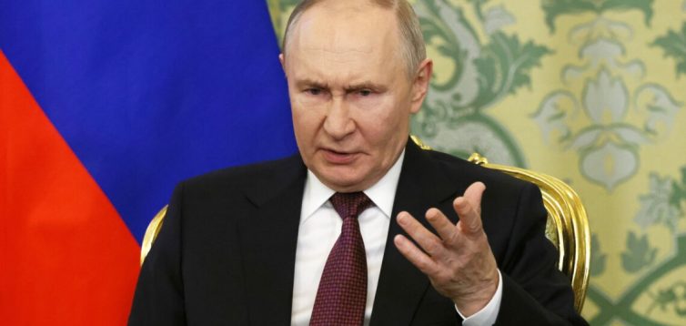 путін