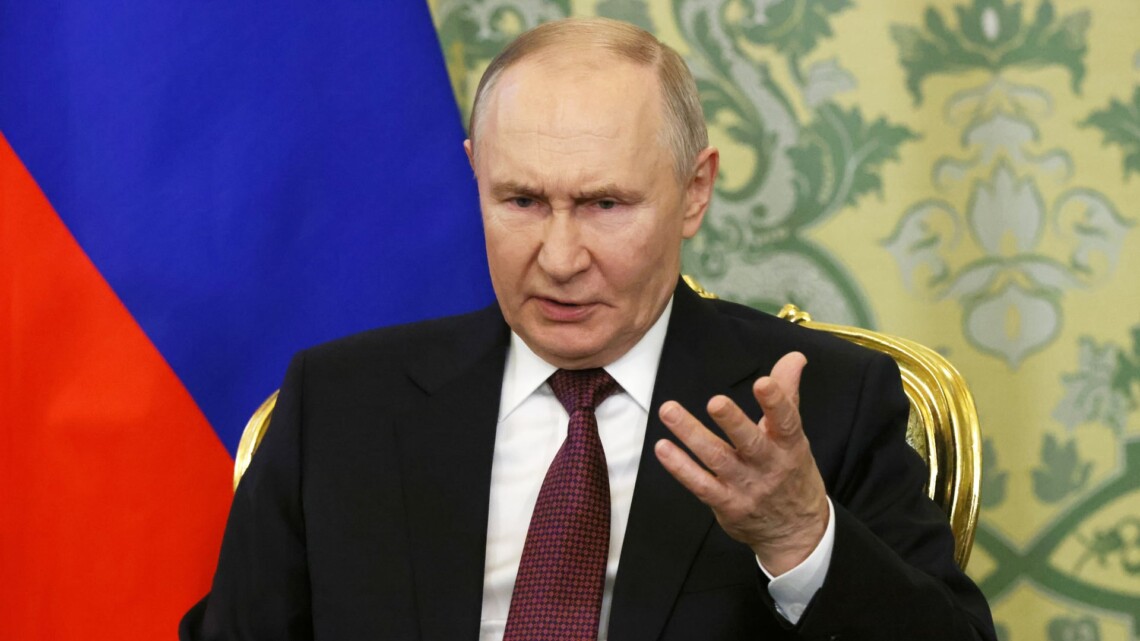путін